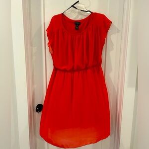 Sleeveless chiffon dress with empire waist.